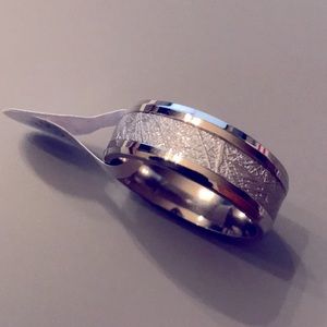 Titanium steel men’s ring. One size 10 and one size 11. NWT. Interested? OFFERS!